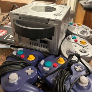 Nintendo game cube.  Plus 4 wired controllers